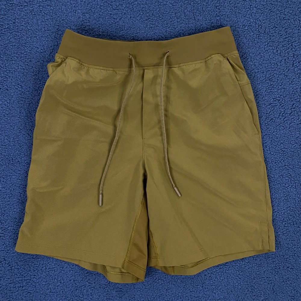 Lululemon THE Short Mens Small Linerless 7" Inseam Drawstring Ochre Mustard